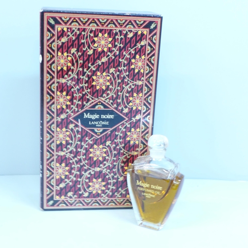 619 - A bottle of Magie Noire Lancôme perfume, boxed