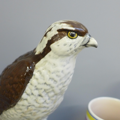 638 - A Carlton Ware owl money box, a Poole vase and a Beswick Osprey whisky flask