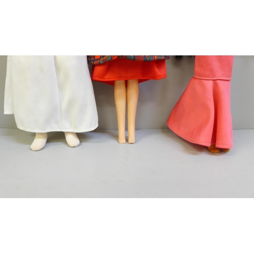 639 - Three dolls, Emma Peel 1960s Avengers TV, Princess Leia Star Wars and Cher
