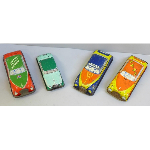 645 - Four Glamorgan Toy Product GTP tin-plate cars, 531, 534, 576 and 533