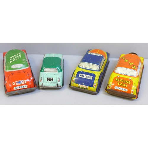 645 - Four Glamorgan Toy Product GTP tin-plate cars, 531, 534, 576 and 533