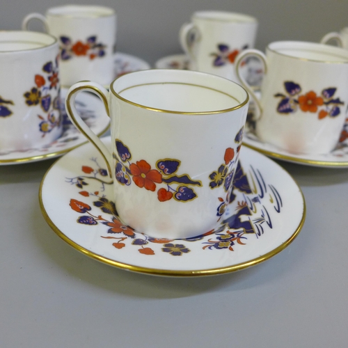 647 - A Royal Grafton Indian Tree coffee set and an Aynsley Bird of Paradise coffee set, (6 cups and sauce... 