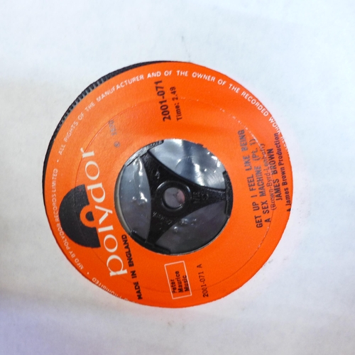 663 - A collection of 45rpm records (65) including Queen