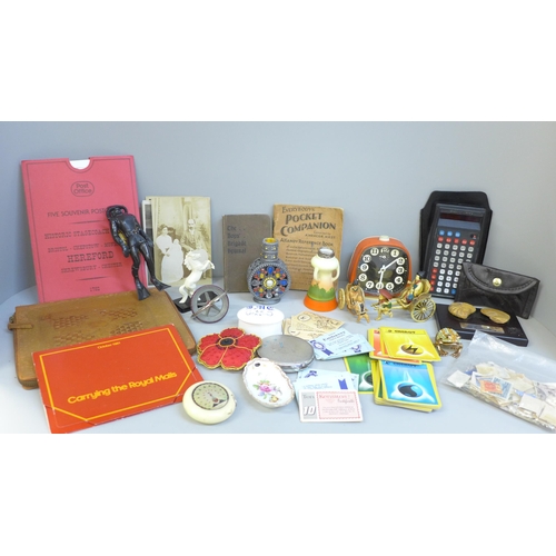 672 - A collection of assorted items including stamps, Pokemon cards, a clock, etc.