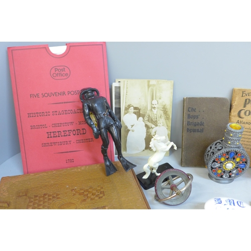 672 - A collection of assorted items including stamps, Pokemon cards, a clock, etc.