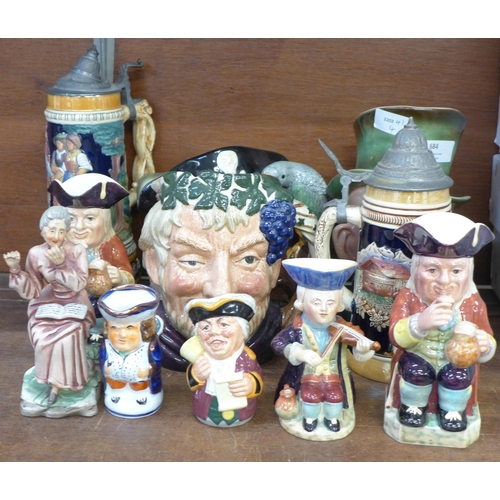 684 - Two large Royal Doulton character jugs, Long John Silver and Bacchus, Beswick Micawber, Beswick Toby... 