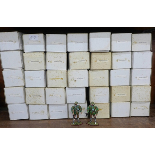 685 - A collection of metal German military figures, Waffen SS in camo smock, boxed (37)