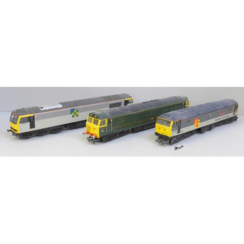 687 - Three Lima OO gauge model diesel locomotives