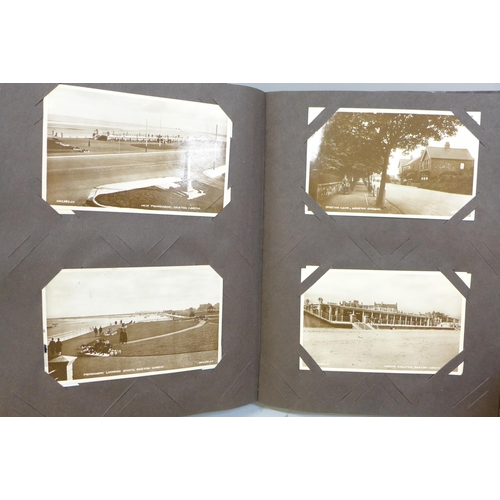 694 - An album of Edwardian and later postcards and a box of Edwardian glass negatives, mainly family grou... 