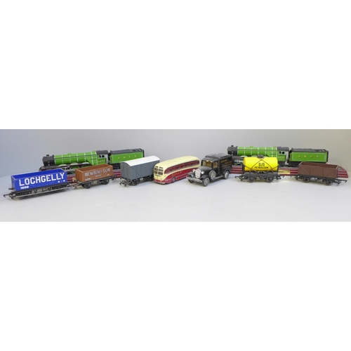 705 - Assorted model vehicles and OO gauge wagons