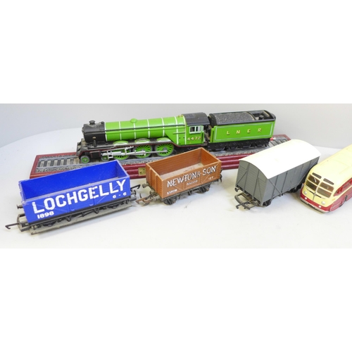 705 - Assorted model vehicles and OO gauge wagons