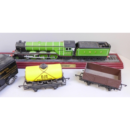 705 - Assorted model vehicles and OO gauge wagons