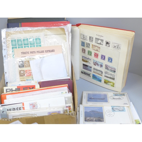 713 - Stamps; a box of stamps, covers, etc.