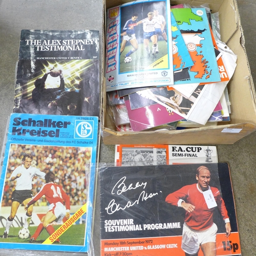 720 - A collection of mainly Manchester United programmes including testimonials and Cup Finals