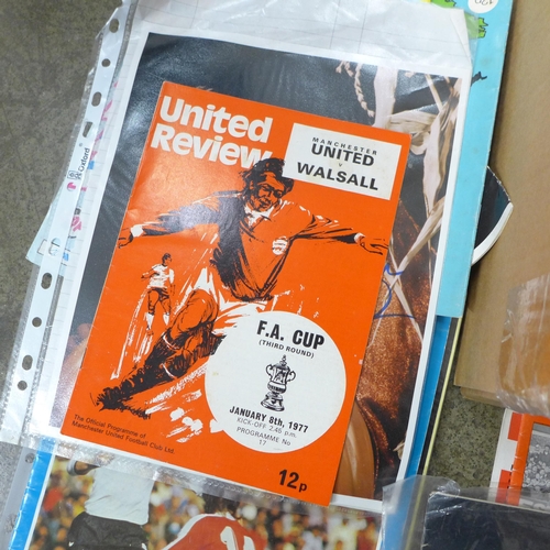 720 - A collection of mainly Manchester United programmes including testimonials and Cup Finals