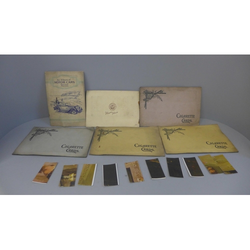 721 - A box of cigarette cards and albums