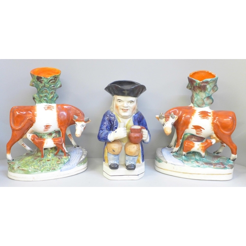 725 - A pair of Staffordshire porcelain spill holders and a Toby jug **PLEASE NOTE THIS LOT IS NOT ELIGIBL... 