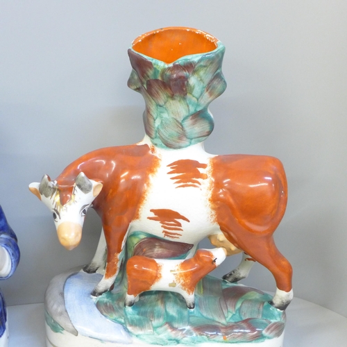 725 - A pair of Staffordshire porcelain spill holders and a Toby jug **PLEASE NOTE THIS LOT IS NOT ELIGIBL... 