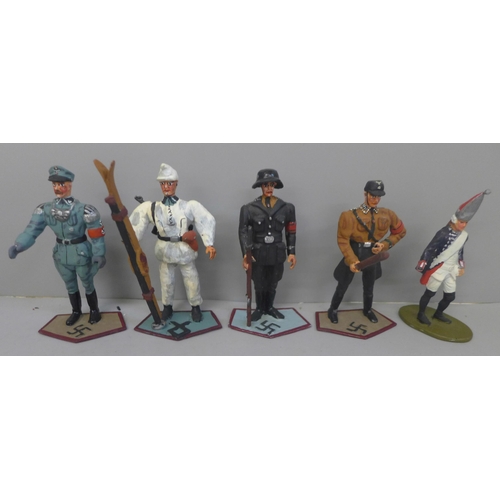 751 - A collection of assorted metal German military figures, various designs