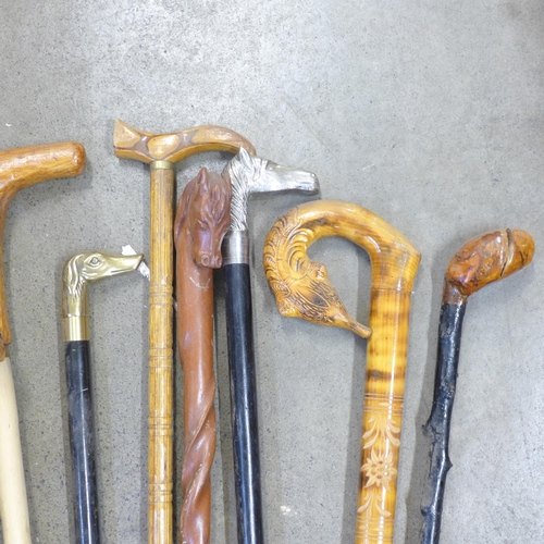 779 - A collection of thirteen walking sticks