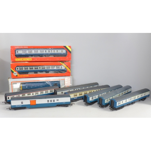 780 - A collection of model rail including eight blue/grey coaches, and a blue diesel Intercity locomotive