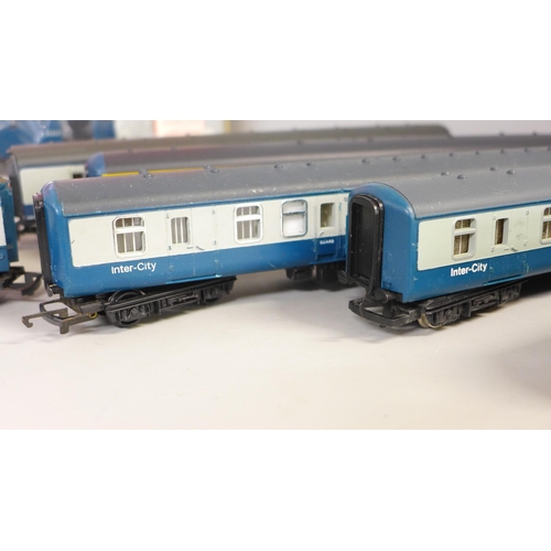 780 - A collection of model rail including eight blue/grey coaches, and a blue diesel Intercity locomotive