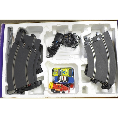 809 - A Scalextric set containing track and cars, incomplete, boxed **PLEASE NOTE THIS LOT IS NOT ELIGIBLE... 