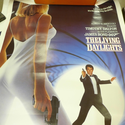 820 - James Bond film posters, lobby cards for Goldeneye, Licence To Kill, etc. (5)