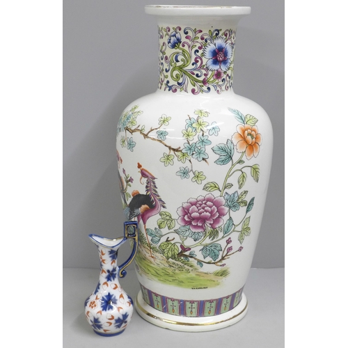 822 - An oriental style vase and a miniature Imari jug