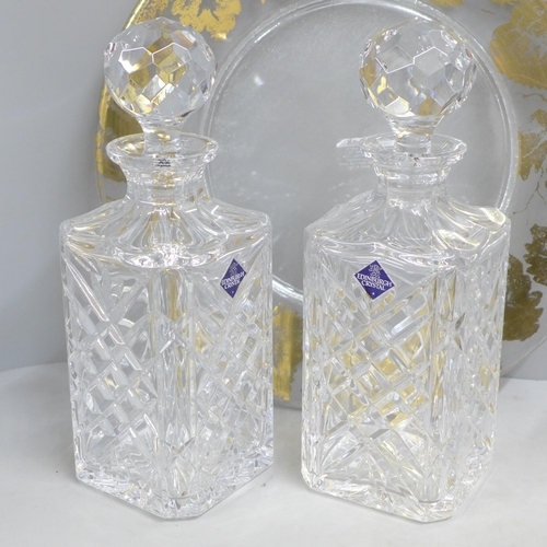 830 - Two Edinburgh Crystal glass decanters, boxed, a pair of Caithness glass vases, boxed, and an Italian... 