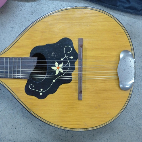 836 - A Martin Smith pink guitar and a vintage mandolin