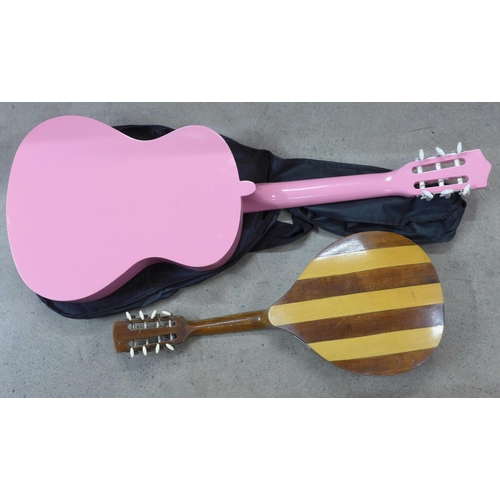 836 - A Martin Smith pink guitar and a vintage mandolin