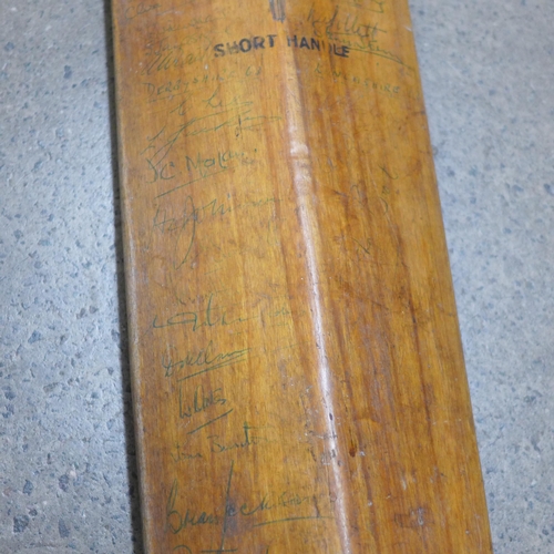 837 - Four autographed cricket bats, the large one with Leics., Surrey, Derbys., Lancs., Notts. and Yorks.... 