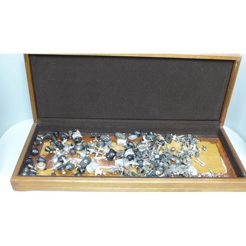 841 - A large wooden box containing over 110 various knobs and screws to fit teapots, coffee pots, dishes,... 