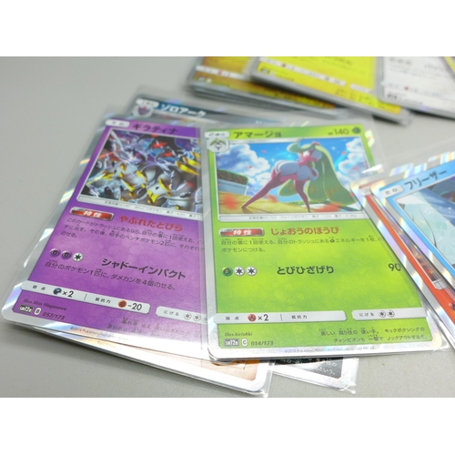 843 - 50 Japanese holographic Pokemon cards