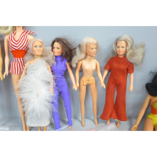 862 - Three 1960s Barbie dolls with 1959 original designer gowns, one undressed Charlies Angels doll and t... 