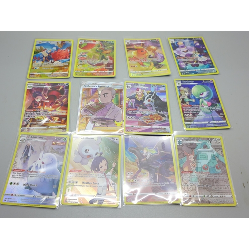 863 - Twelve full artwork holographic Pokemon cards