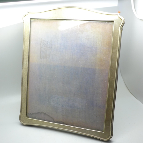 892 - A silver photograph frame with oak panel back and stand, Birmingham 1916, height 30cm