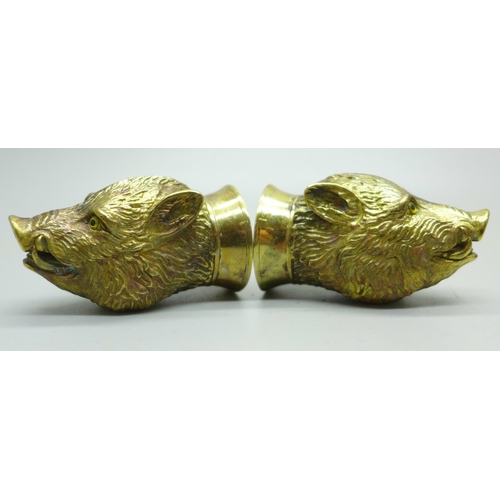 894 - A pair of well modelled gold plated boar's head salt and pepper condiments, marked '18ct gold plate'