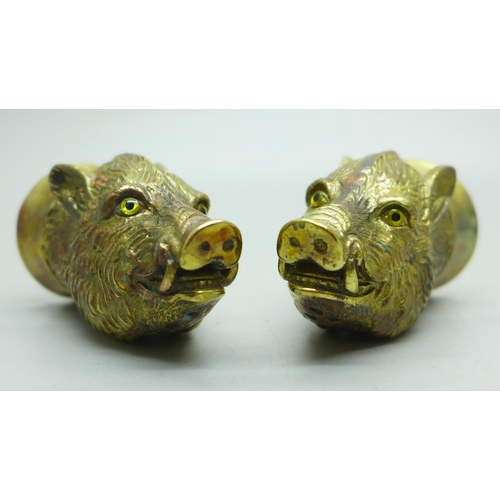 894 - A pair of well modelled gold plated boar's head salt and pepper condiments, marked '18ct gold plate'