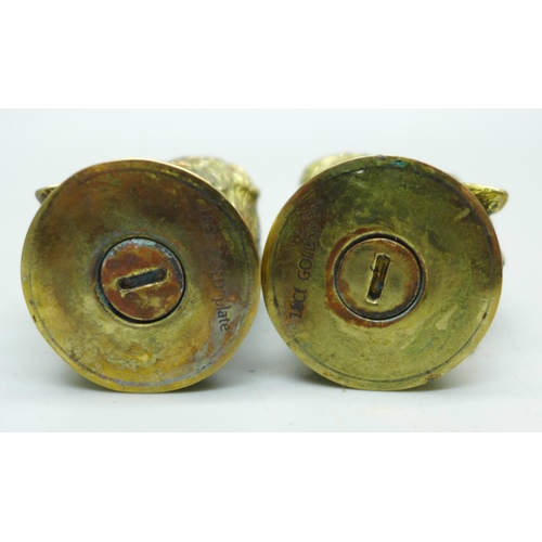 894 - A pair of well modelled gold plated boar's head salt and pepper condiments, marked '18ct gold plate'