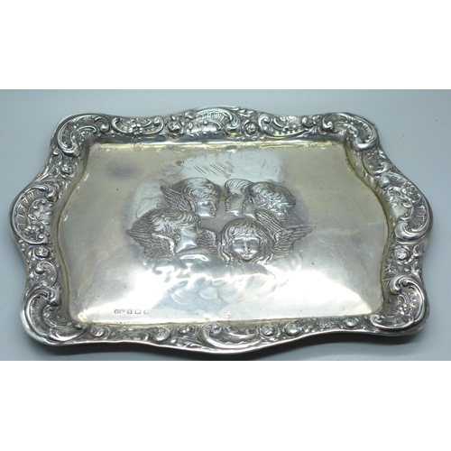 897 - A silver tray with Reynolds Angels detail, Birmingham 1909, 149g, 19cm x 26.5cm