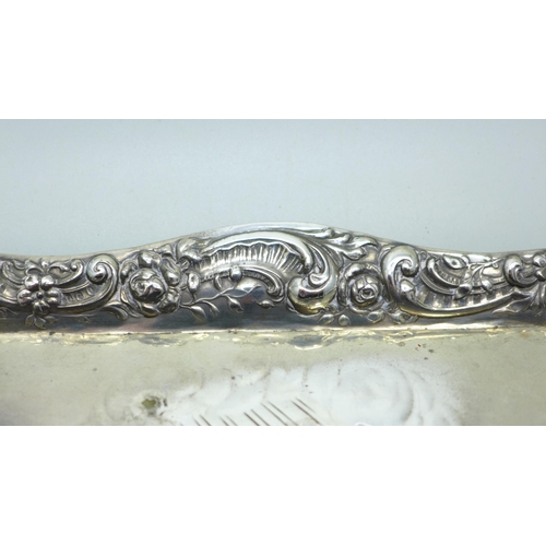 897 - A silver tray with Reynolds Angels detail, Birmingham 1909, 149g, 19cm x 26.5cm