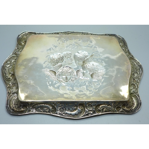 897 - A silver tray with Reynolds Angels detail, Birmingham 1909, 149g, 19cm x 26.5cm