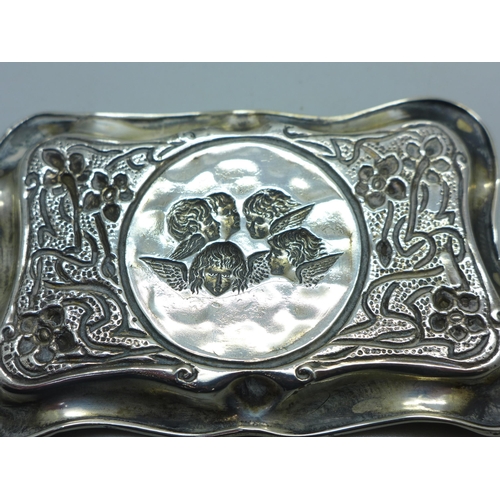 902 - A silver pin or card tray with Reynolds Angels detail, Birmingham 1904, 34g, 6.5cm x 10.5cm