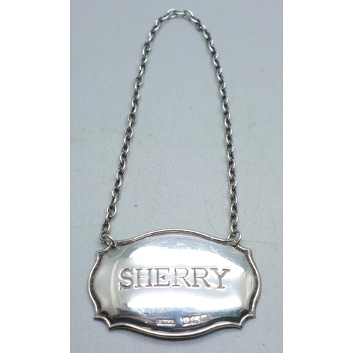 905 - A silver sherry label