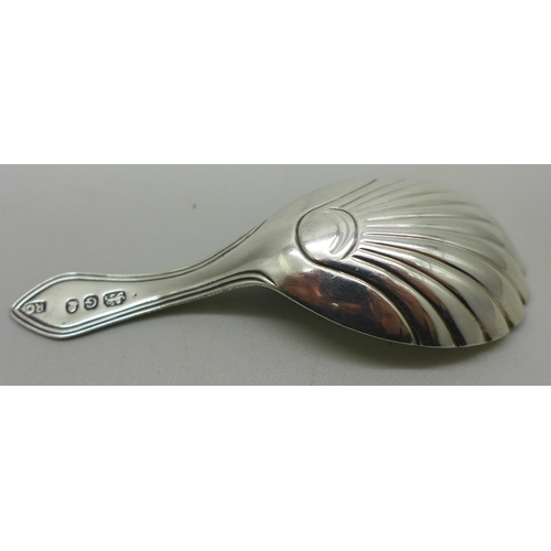 910A - A George III silver caddy spoon, London 1802, maker R.C.