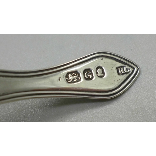 910A - A George III silver caddy spoon, London 1802, maker R.C.