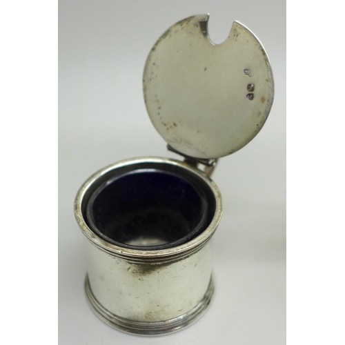 910B - A Victorian silver mustard and pepper, London 1885/6, and a silver salt, 111g