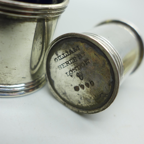 910B - A Victorian silver mustard and pepper, London 1885/6, and a silver salt, 111g